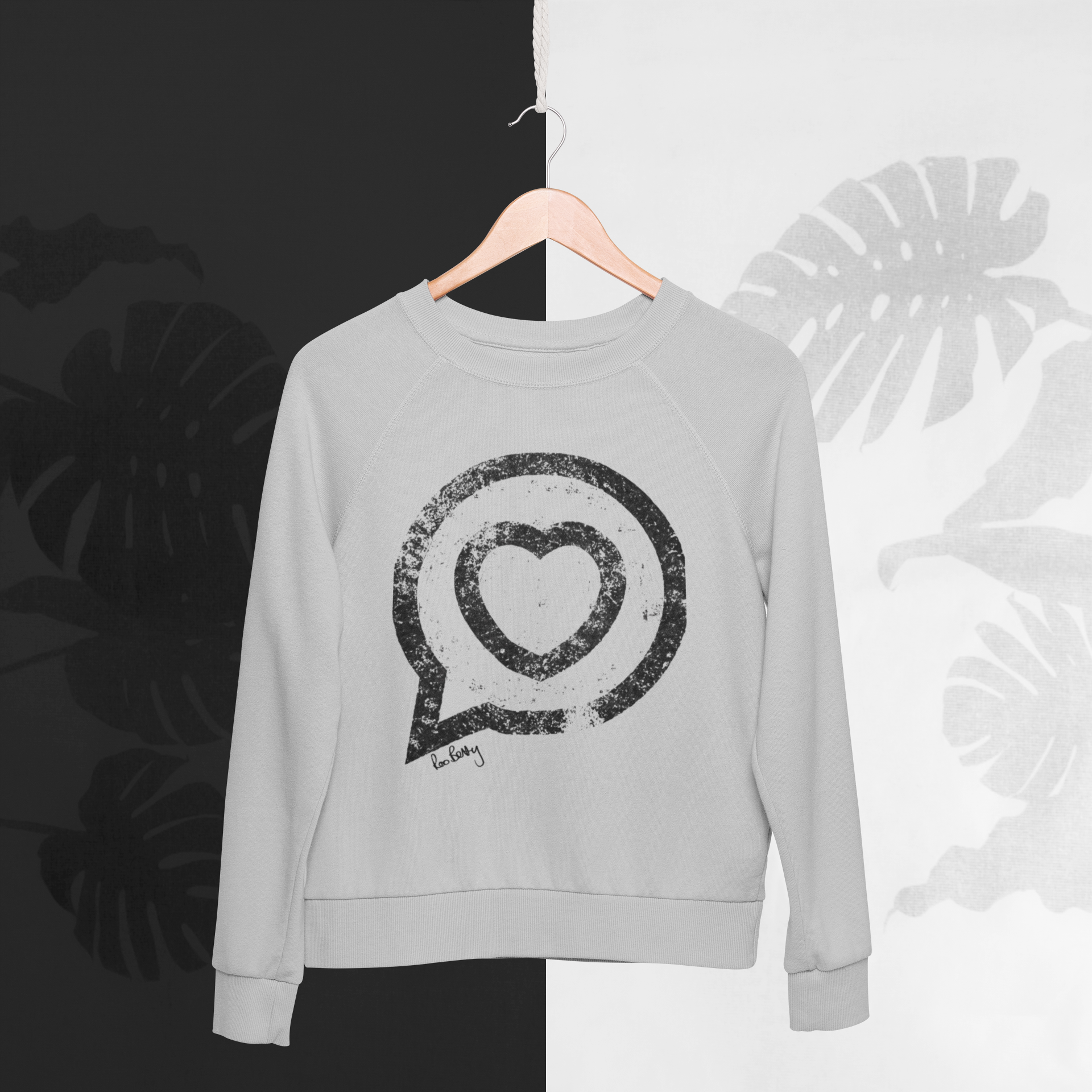 Greay Ambassador Sweatshirt with Black vintage logo of a heart in a speech bubble on a black and white background 