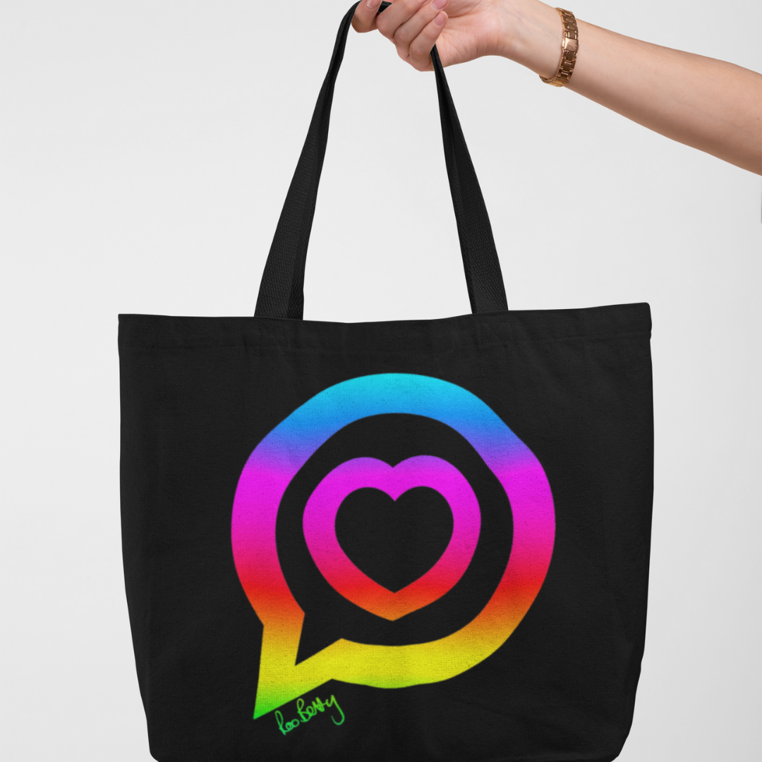 Large black tote bag with a bright rainbow vinyle of the Roo betty logo of a heart in a speech bubble to the front 