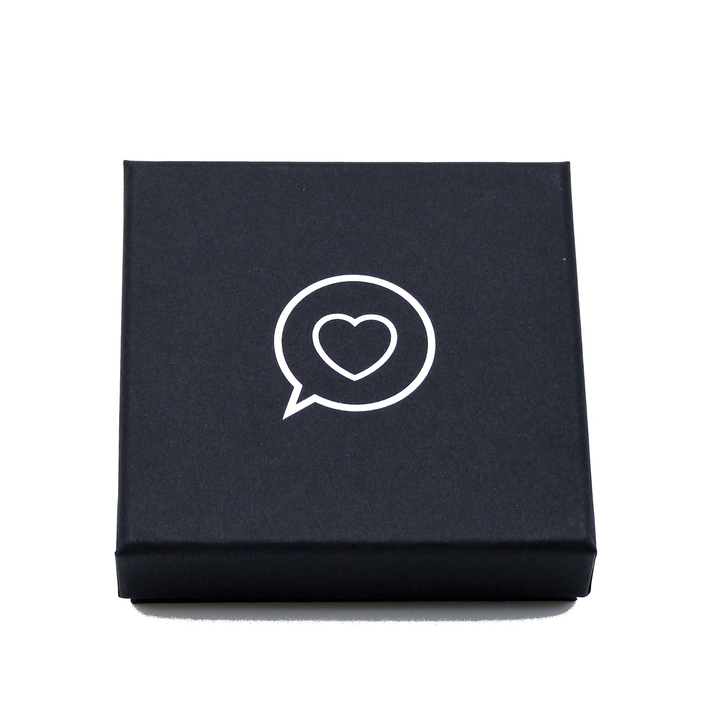Black bracelet gift box with white foil inlay of the Roo Betty logo of a heart in a speech bubble.